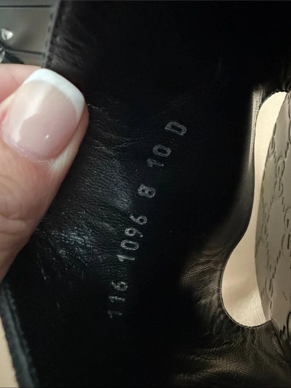 Gucci Men’s Black Embossed Logo Slide Sandals